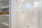 Shower Area with Ample Storage Space for Personal Items